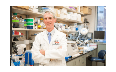 Mark Payne, MD, in his lab
