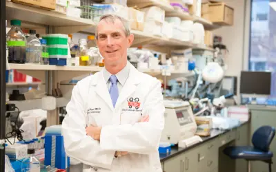 Mark Payne, MD, in his lab
