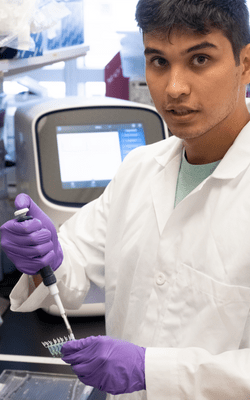 Male student working in a lab during the MPESC program