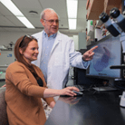 Wade Clapp and Dana Mitchell working in the lab.