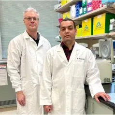 Drs. Herzog and Kumar in the lab