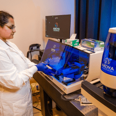 Sonali Karnik, PhD, with imaging equipment