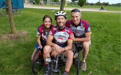 Mark Payne with Kyle Bryant and Emily Young his left in matching biking attire at a fundraiser benefiting FARA