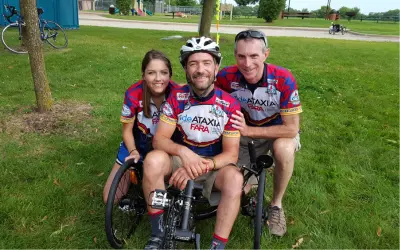 Mark Payne with Kyle Bryant and Emily Young his left in matching biking attire at a fundraiser benefiting FARA
