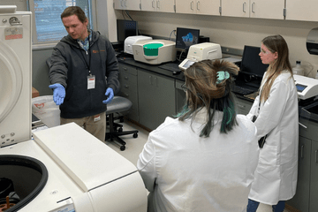 Radek Kaczmarek, PhD, MSC, discussing his tools and research to high school students interested in science