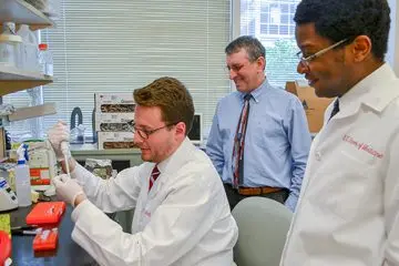 Three Wells Center researchers working in the lab