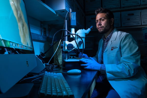 Victor Canela in a lab