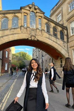 At Oxford, Contreras Burrola honed her skills in computational biology. | Photo courtesy Cristie Contreras Burrola Contreras Burrola posing in front of Oxford's Hertford Bridge.