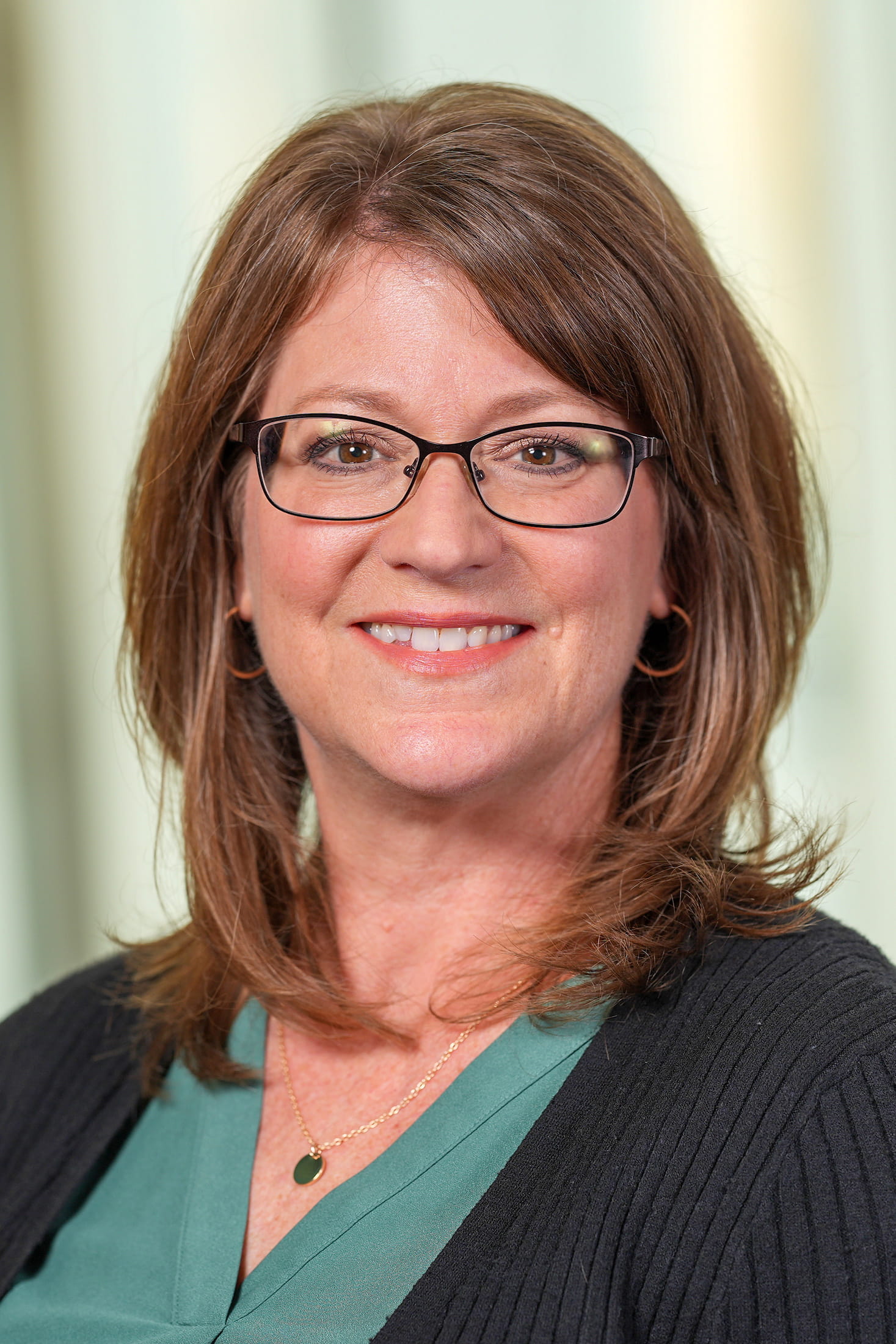 Headshot of Carla Davis smiling.