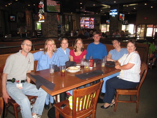 Chief residents with clerkship coordinator eating lunch