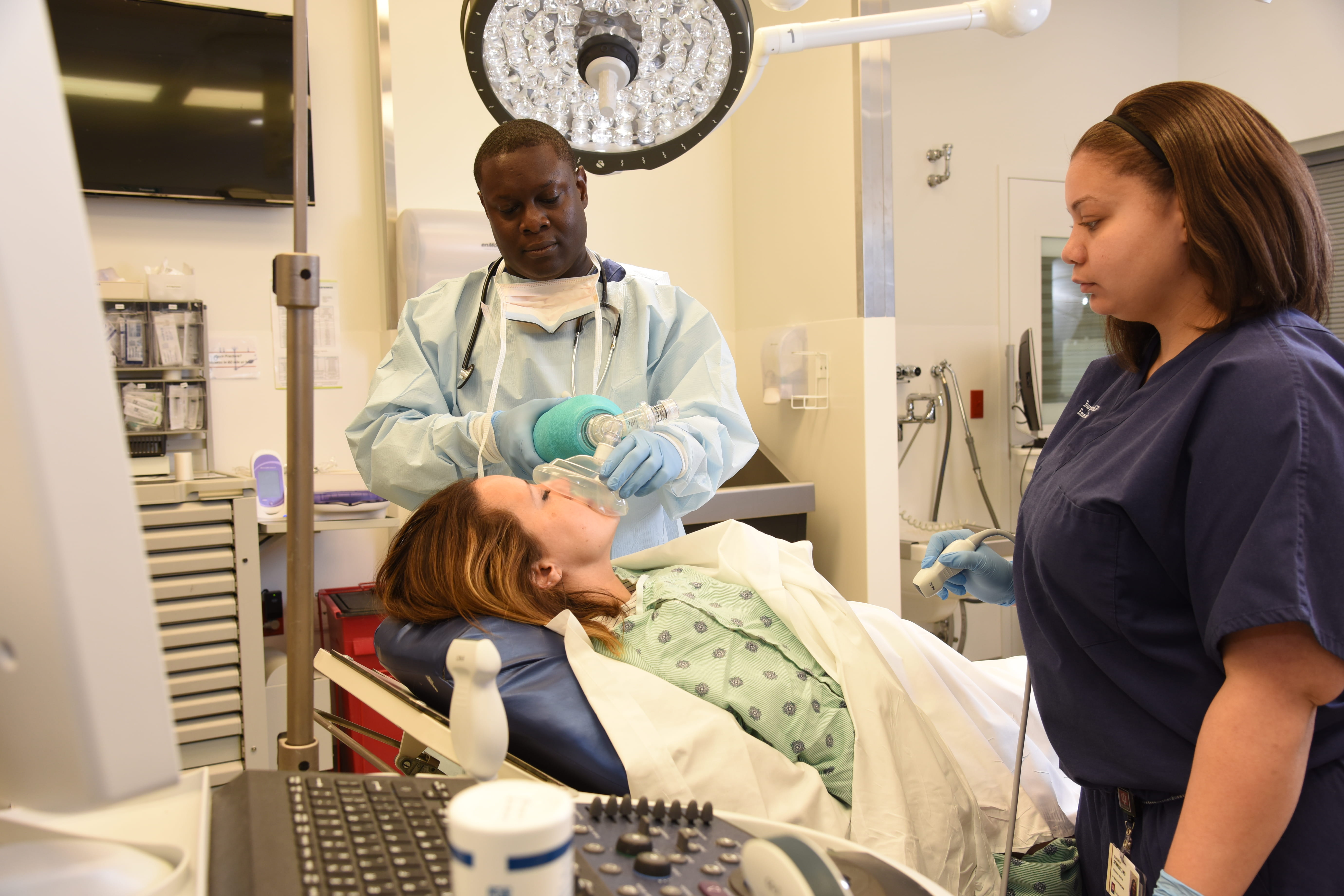 Dr. Paul Musey interacts with a student. 