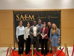 members of the department of emergency medicine receive an award