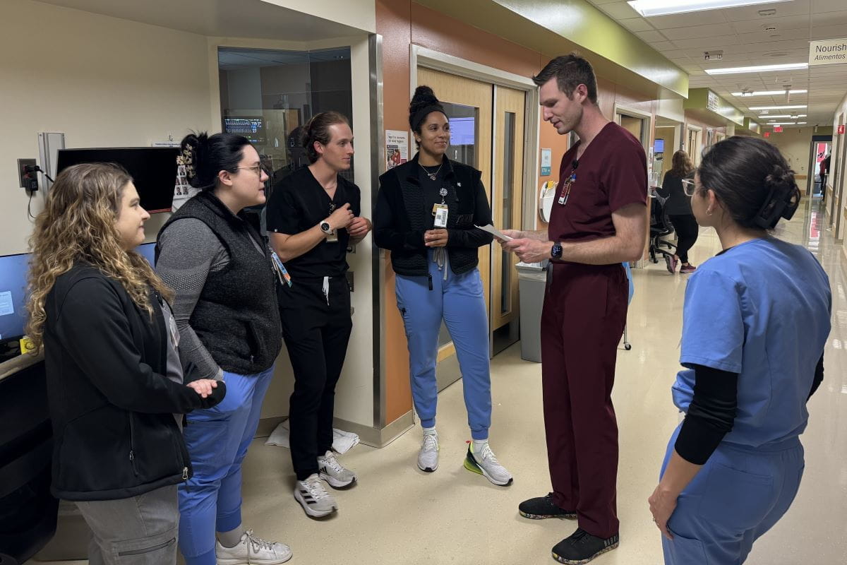 Drs. Brenner and Harris talk through a case in the clinic