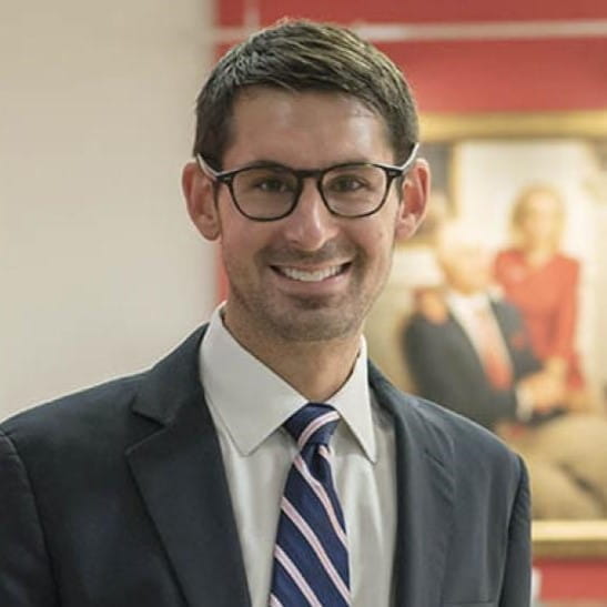 Evan Graboyes in a suit and tie