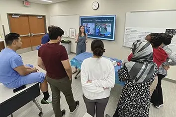 Residents attend a didactics session.
