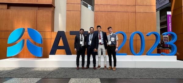 Four residents at ATI conference.
