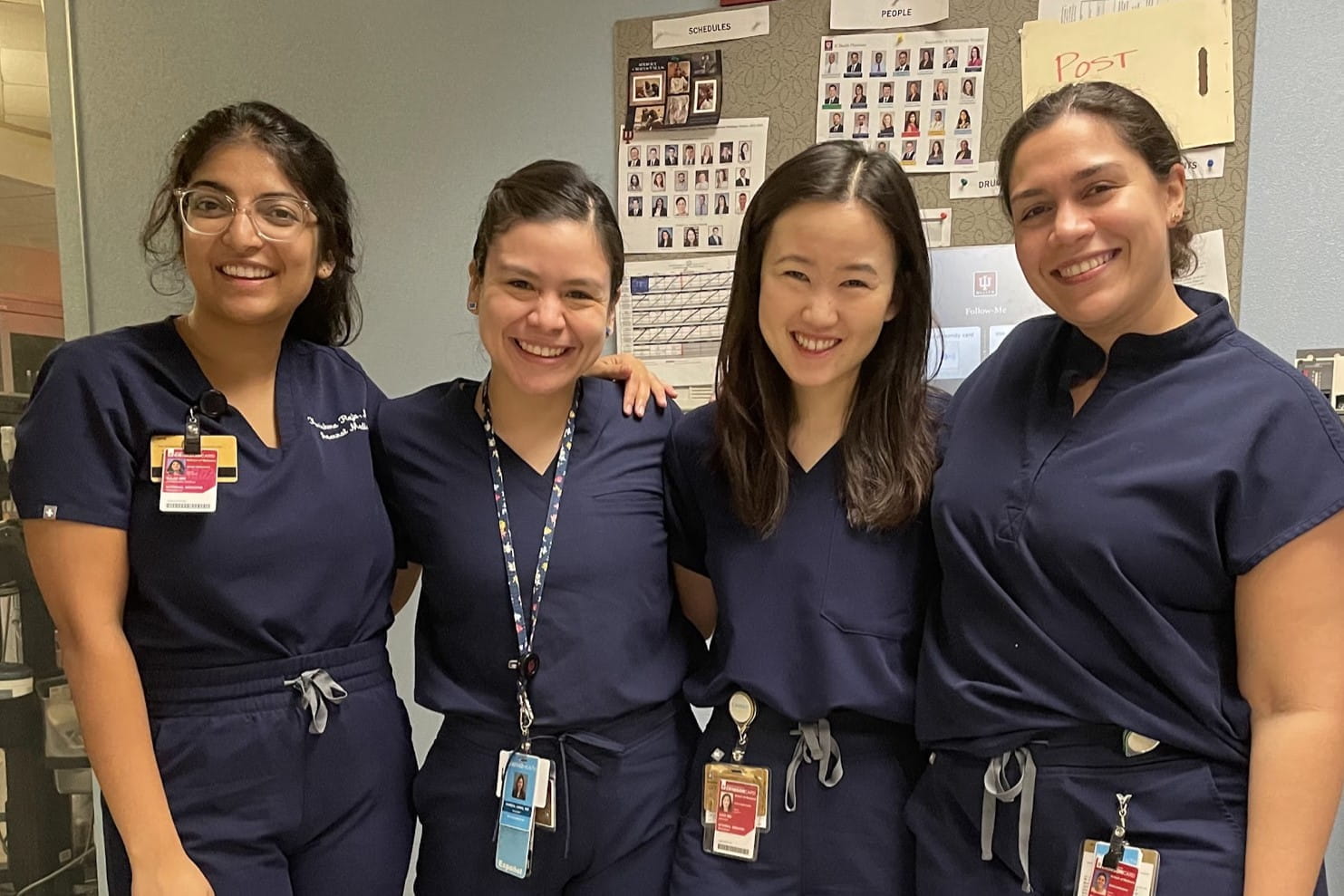 4 residents posing on wards.