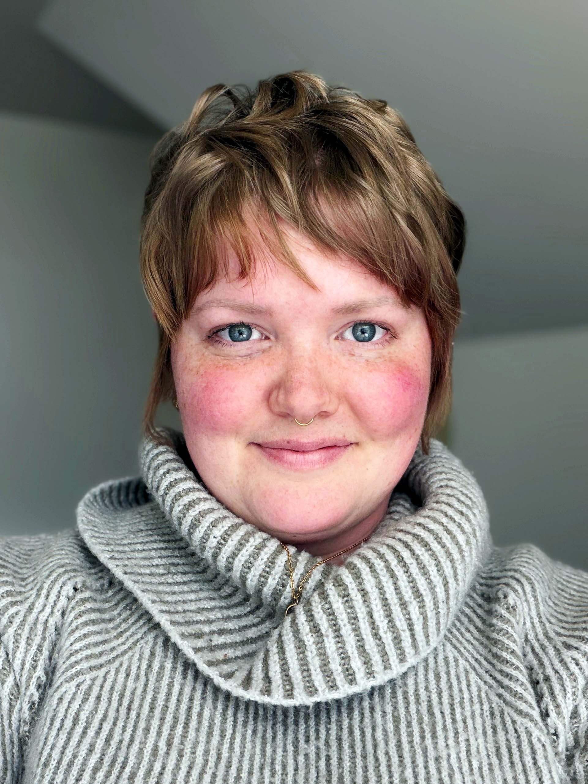 Photo of Emily Smith smiling.