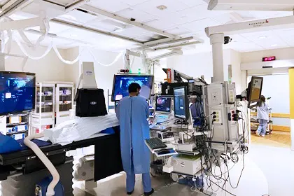 a surgeon at work in the operating room