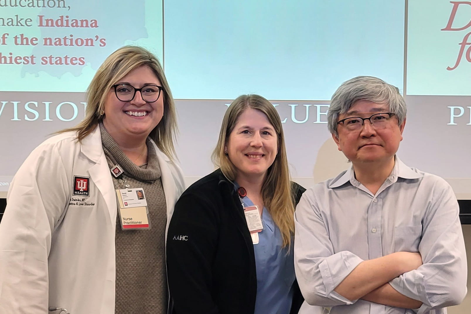 Group photo of Sarah Stainko, Laura Worley and John Wo