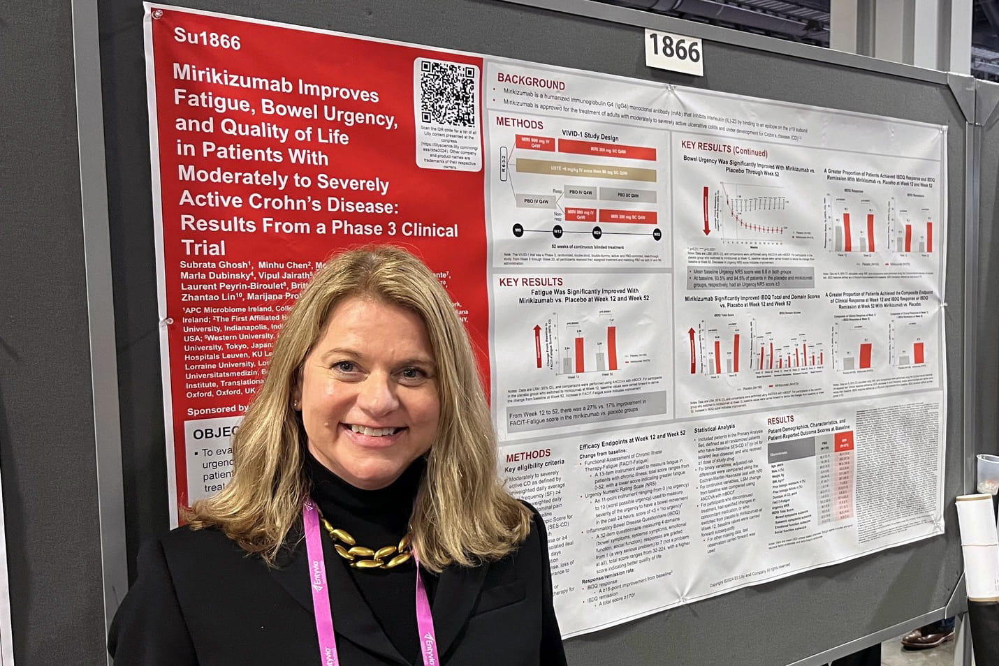 Photo of Dr. Fischer with her poster at DDW conference in 2024.