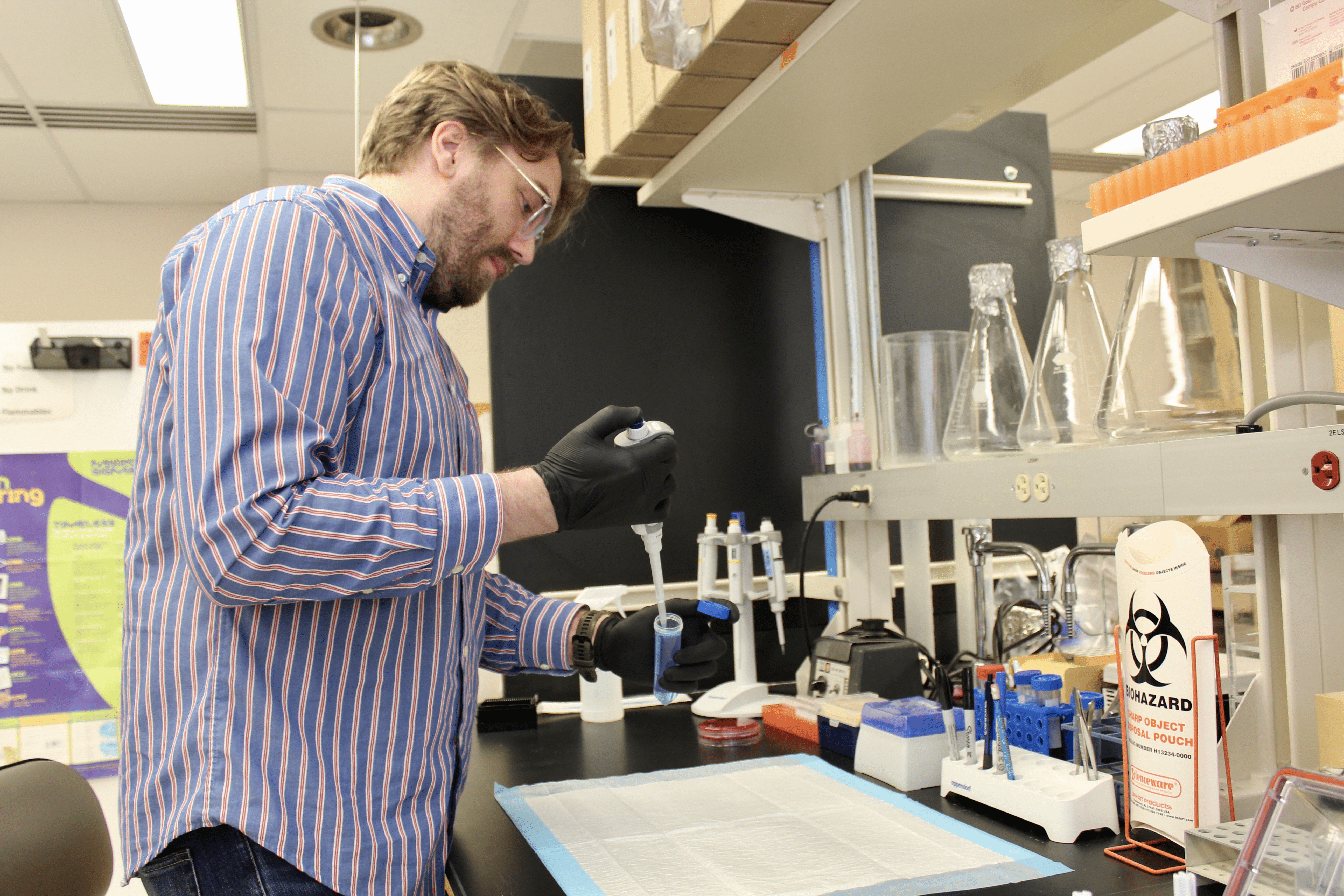 Dr. Caleb Ardizzone making test sample.