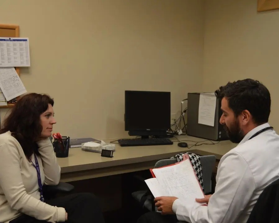 two fellows review a case together