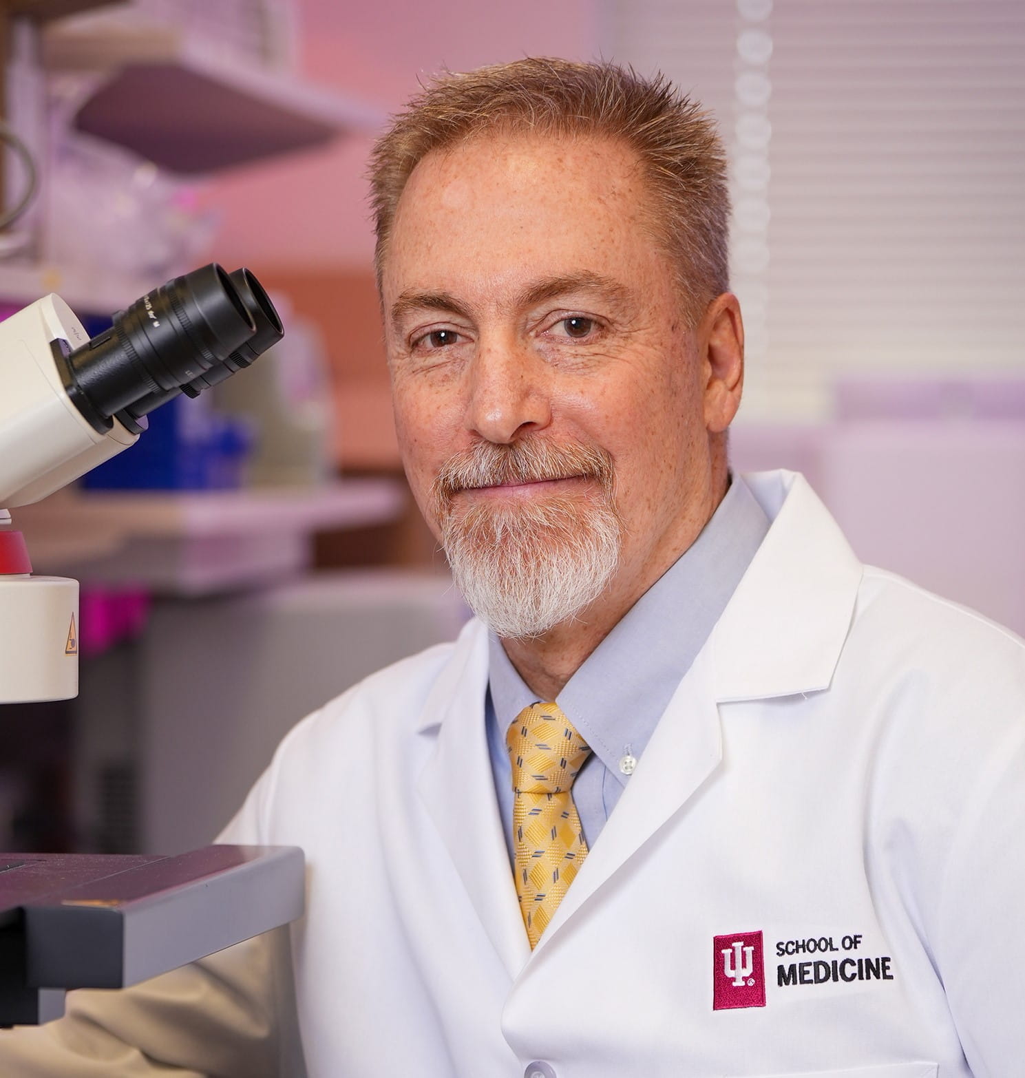 Paul Territo, PhD sitting in lab