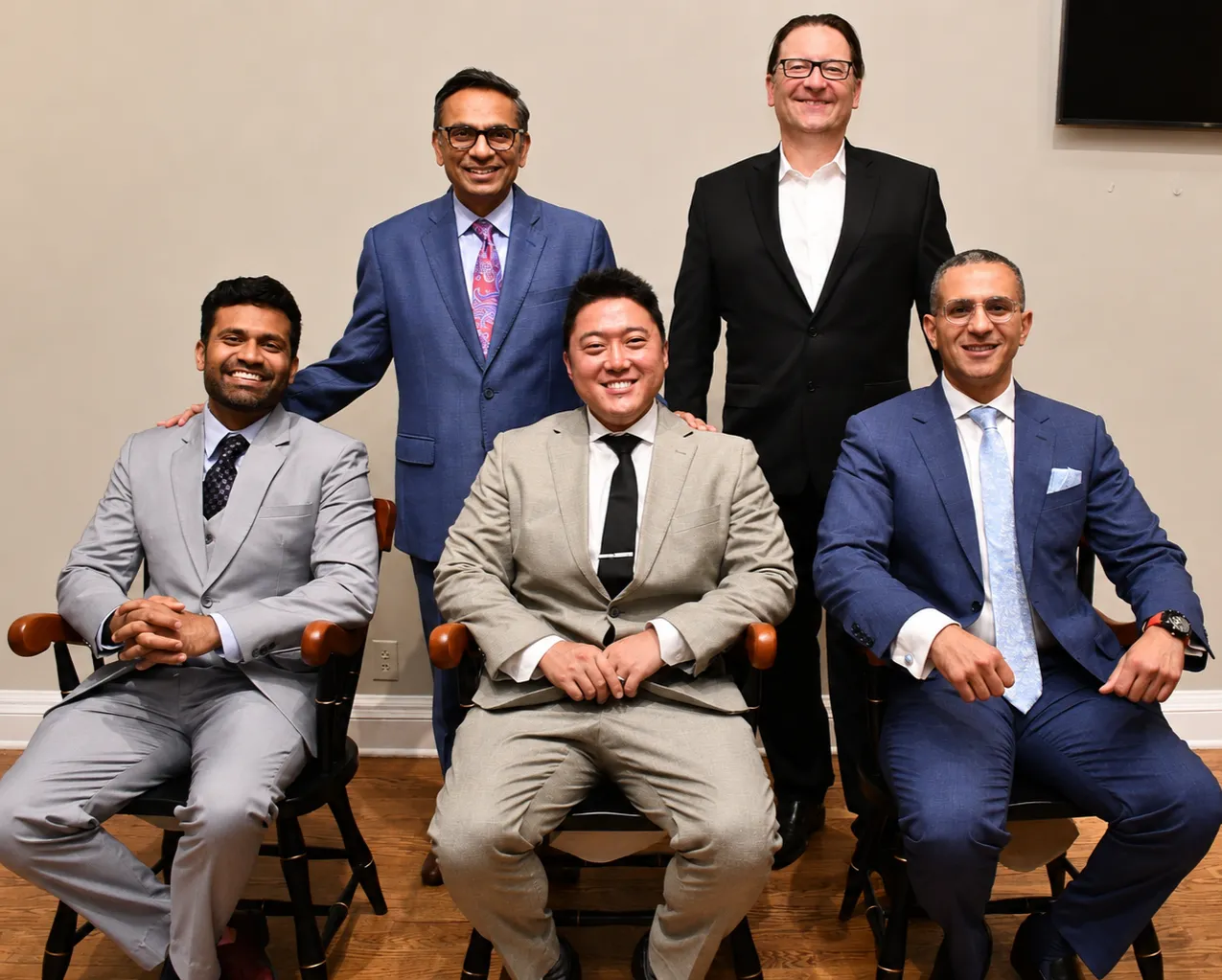 Dr. James Miller and Chair Dr. Mitesh Shah with 2026 neurosurgery residency graduates.