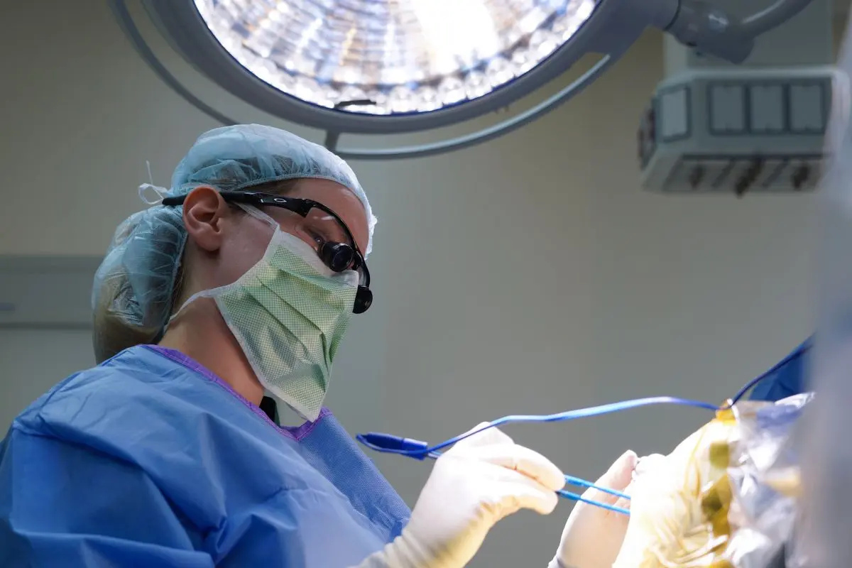 A neurosurgeon performs surgery in the OR