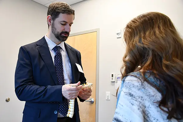 Dr. Bohnstedt meet with a patient in the clinic