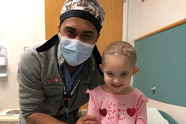 Dr. Jignesh Tailor with Cecilia Crockett in the clinic