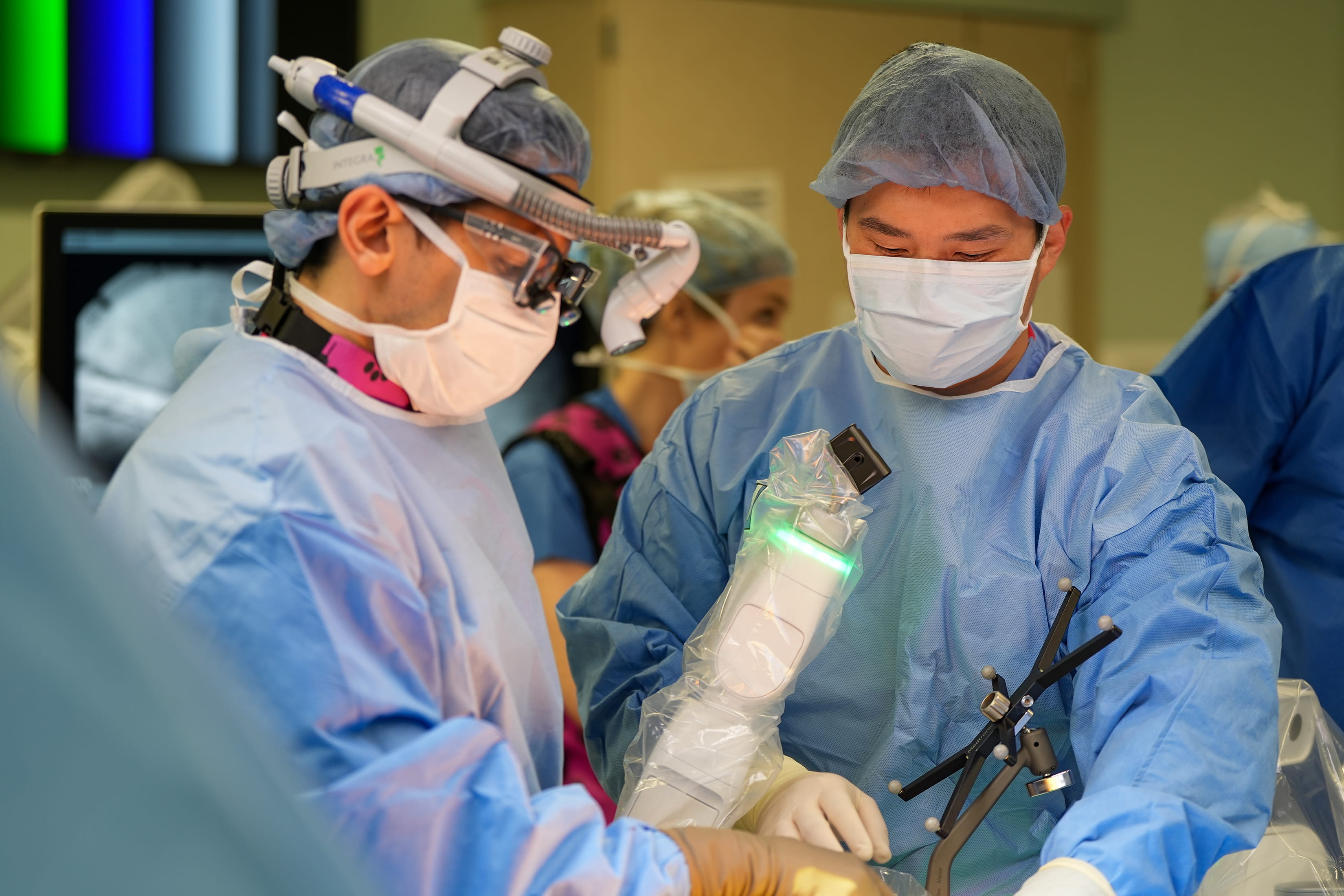Two spinal surgeons in the operating room