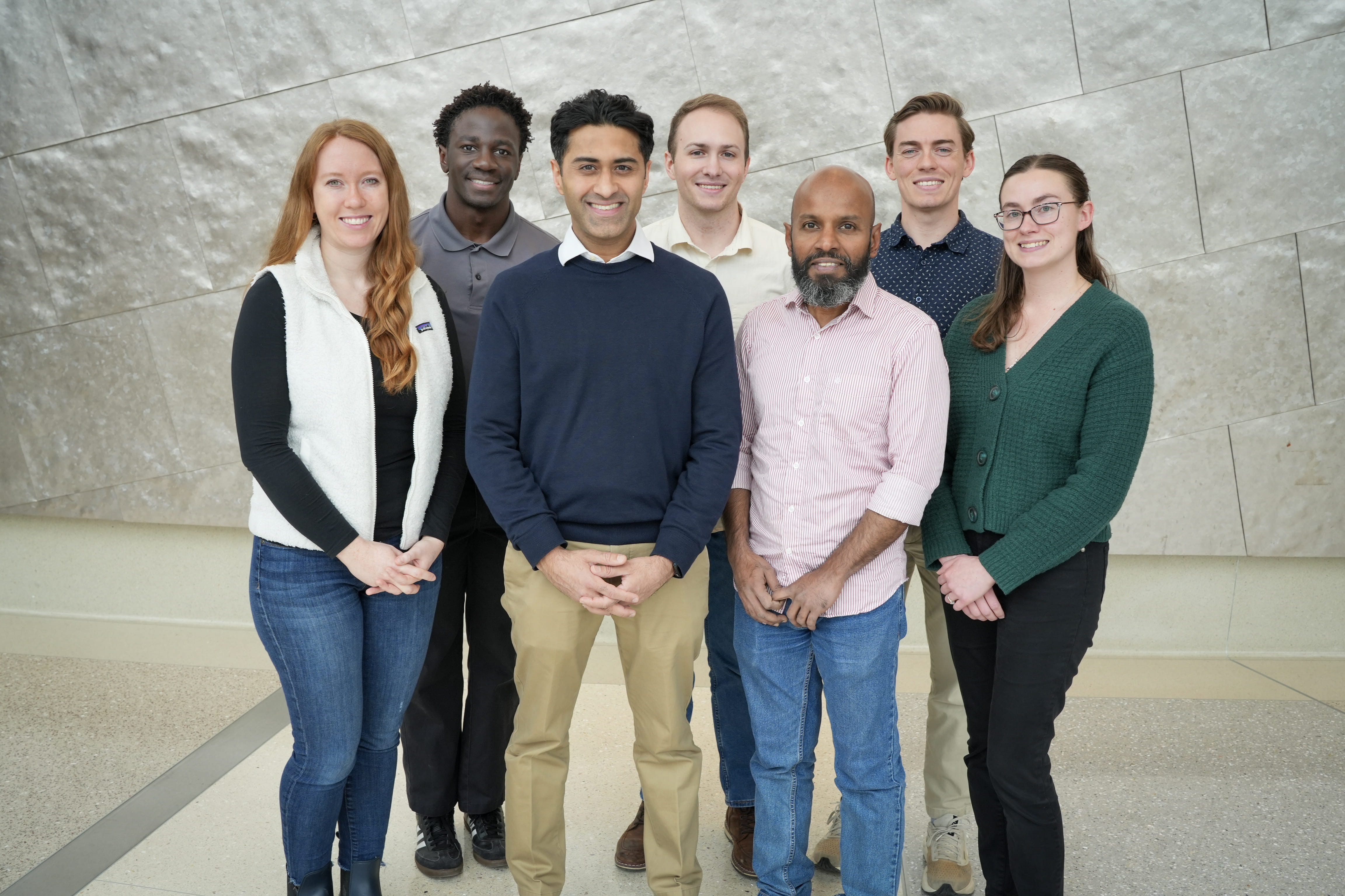 Dr. Jignesh Tailor (center) and his lab group