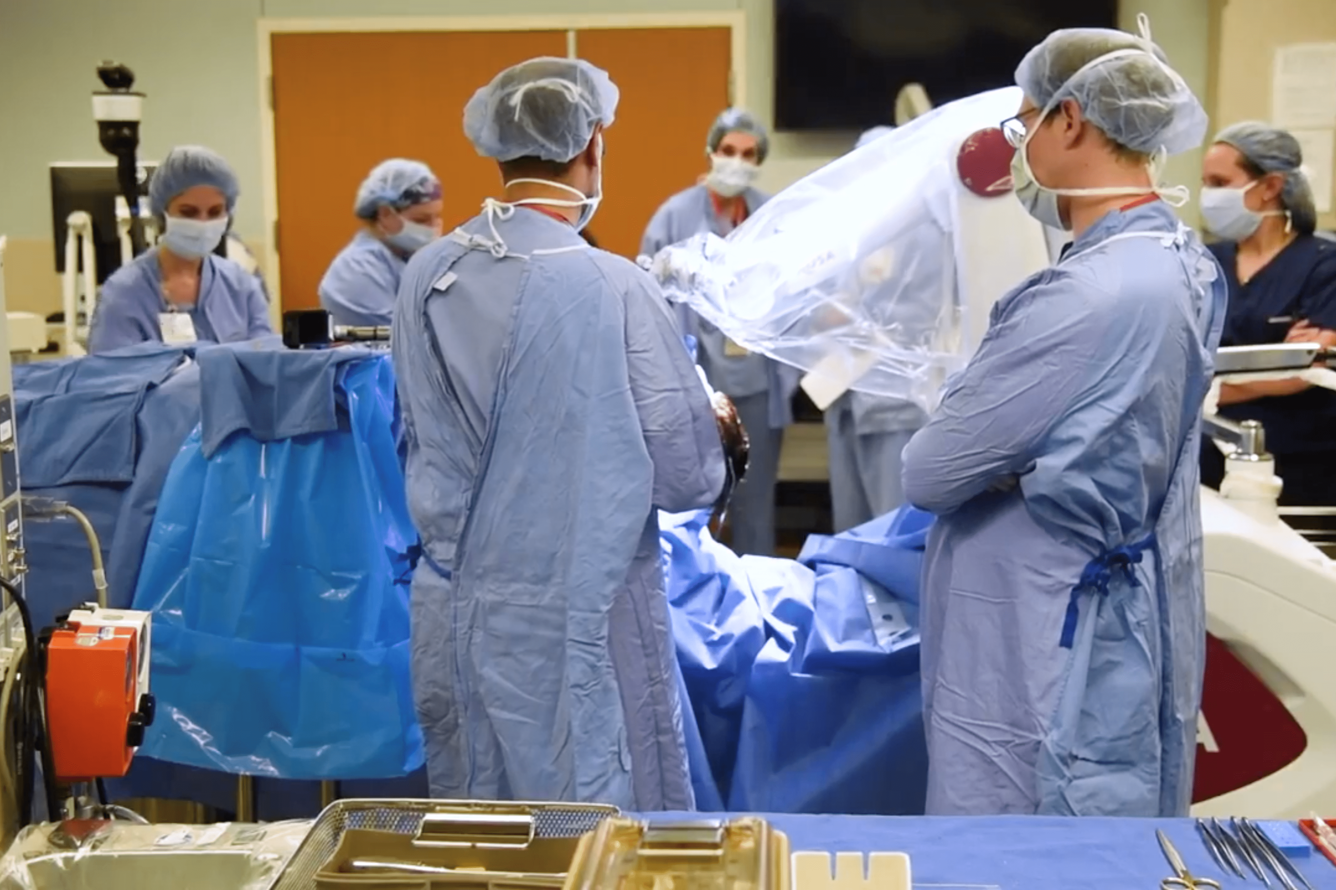 neurosurgeons perform surgery in the OR