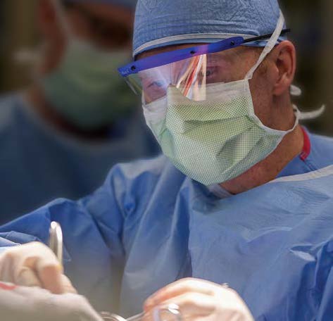 a surgeon performs surgery