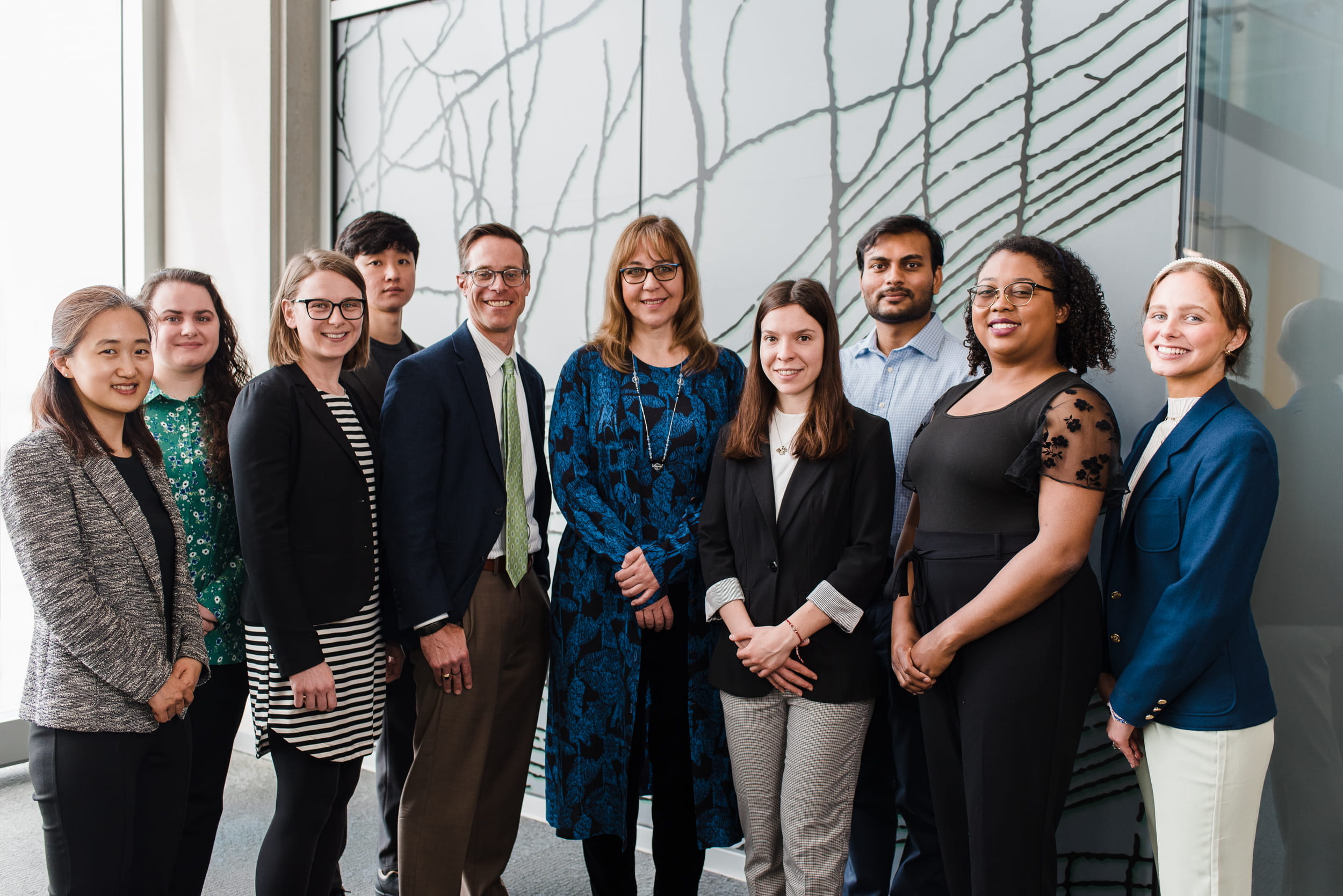 a group photo of the Apostolova Lab