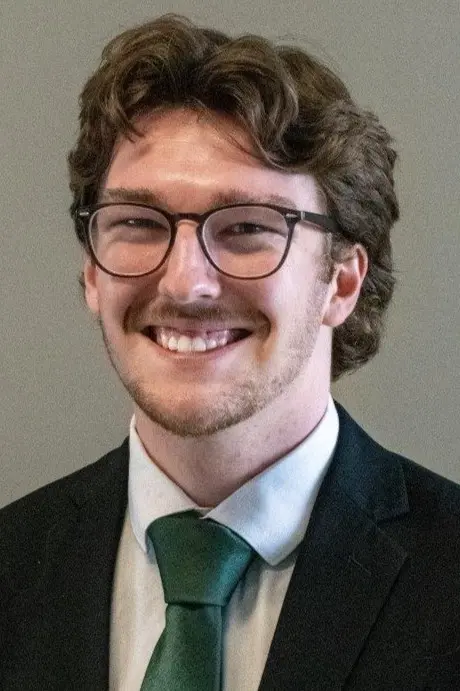 a headshot of Jordan Weddle