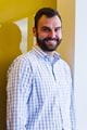 a headshot of Justin Bushnell