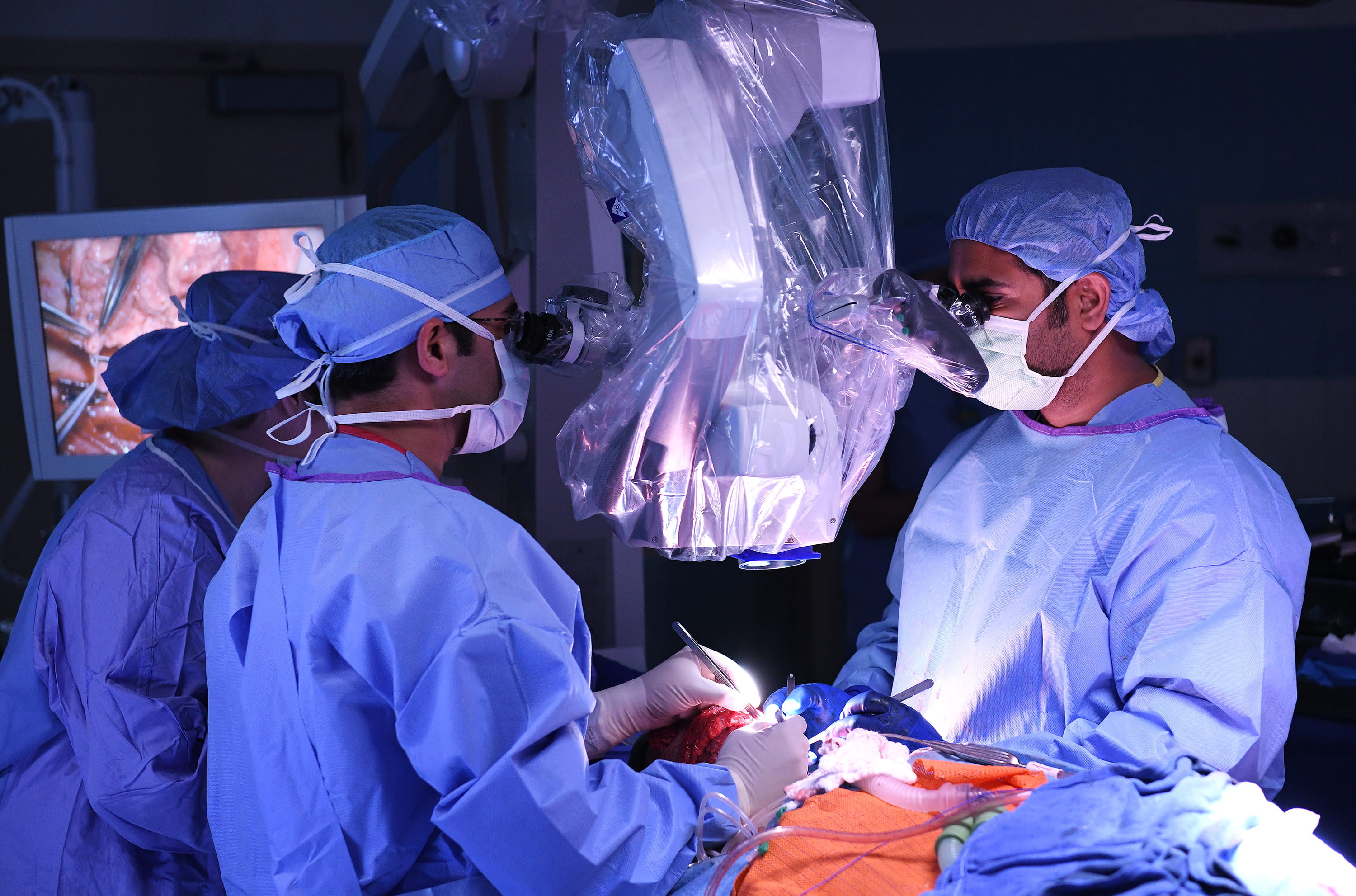 otolaryngology surgeons at work in the operating room