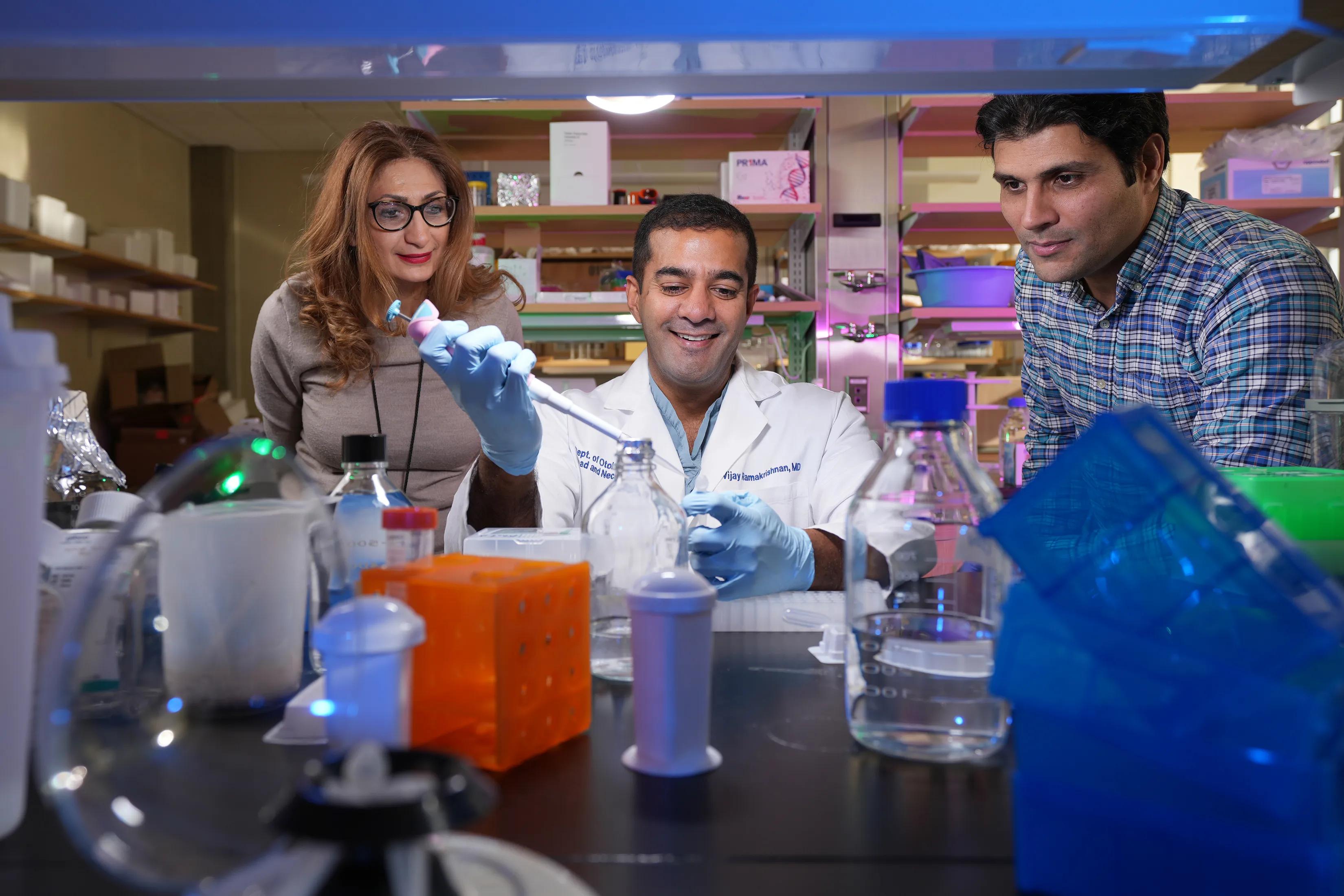 Researchers working in research lab