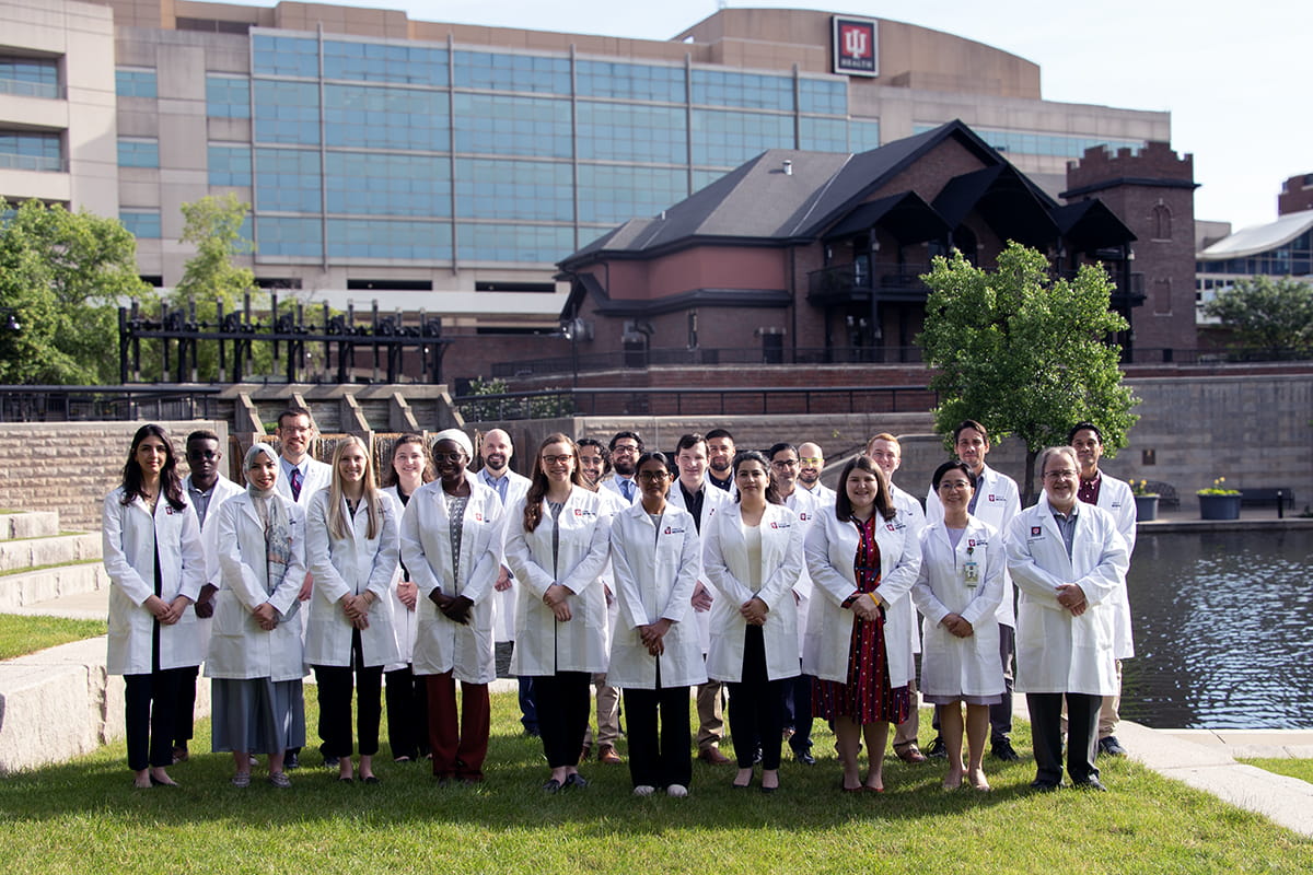 Photo of students in front of building