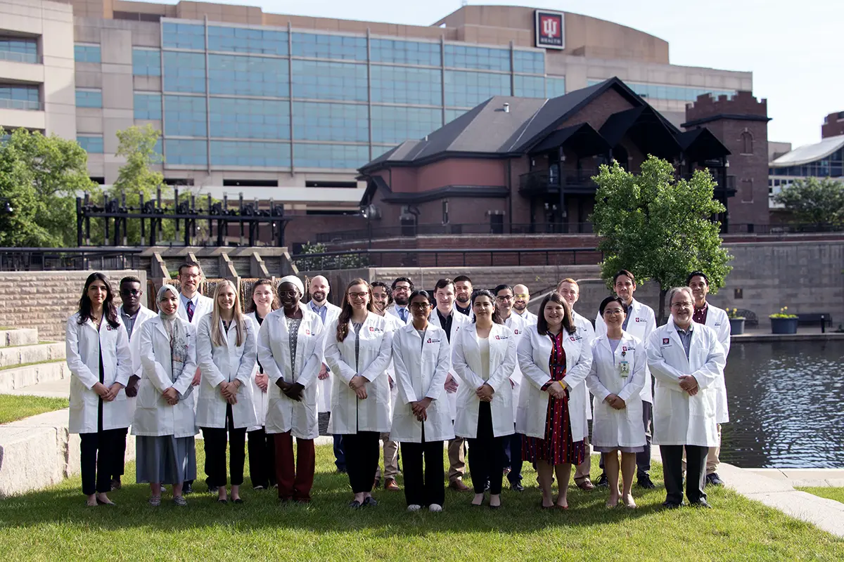 Photo of students in front of building