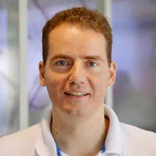 Dr. Garyfallidis wearing a white polo shirt