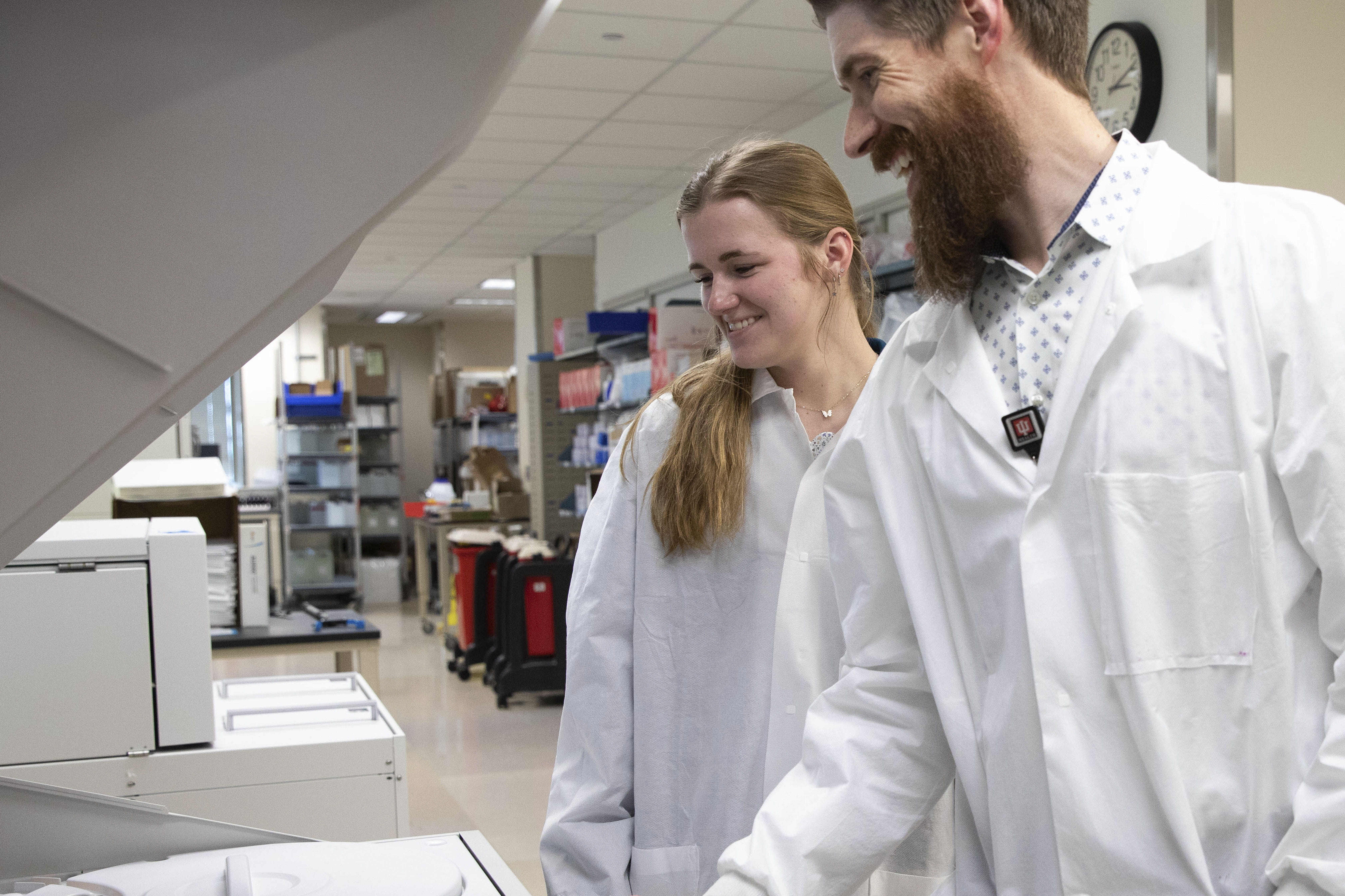 Two IU doctors looking at a computer in a llab