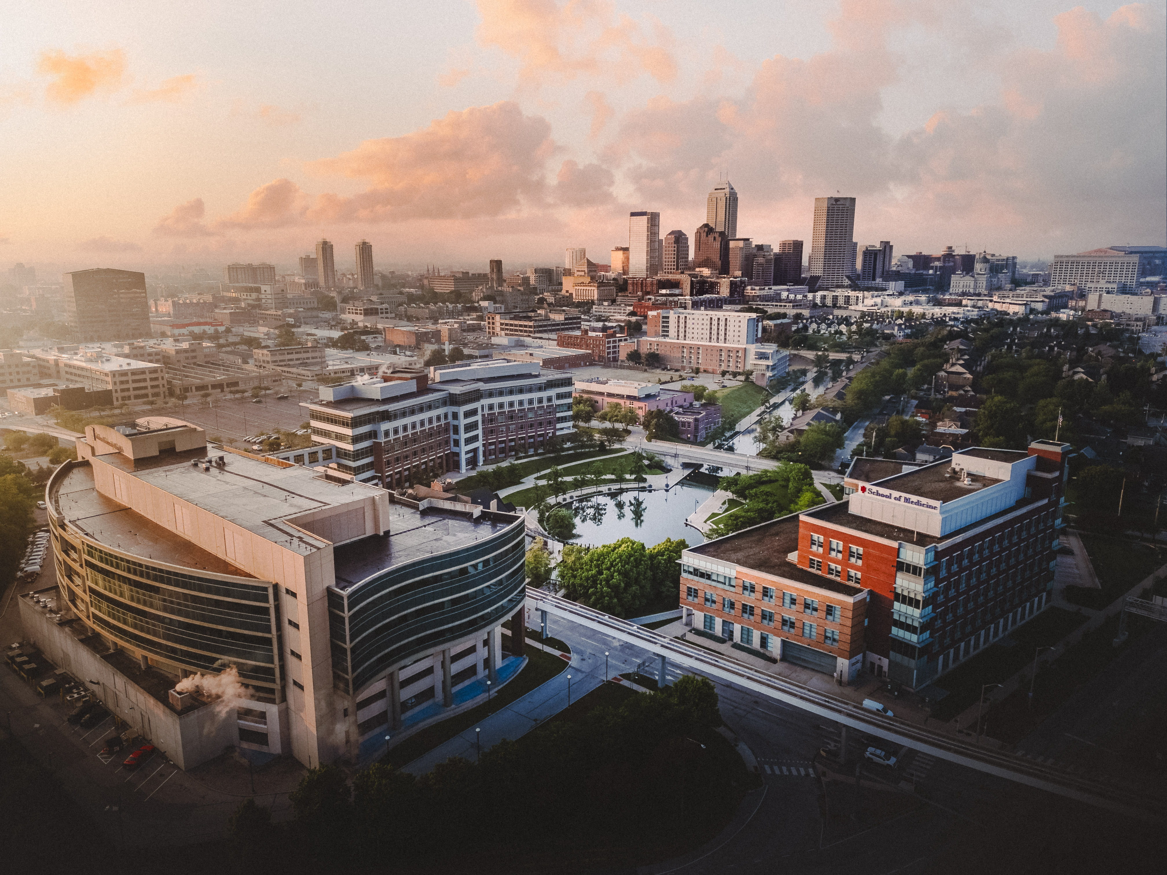 aerial view of the Indianapolis skyline and canal at sunrise