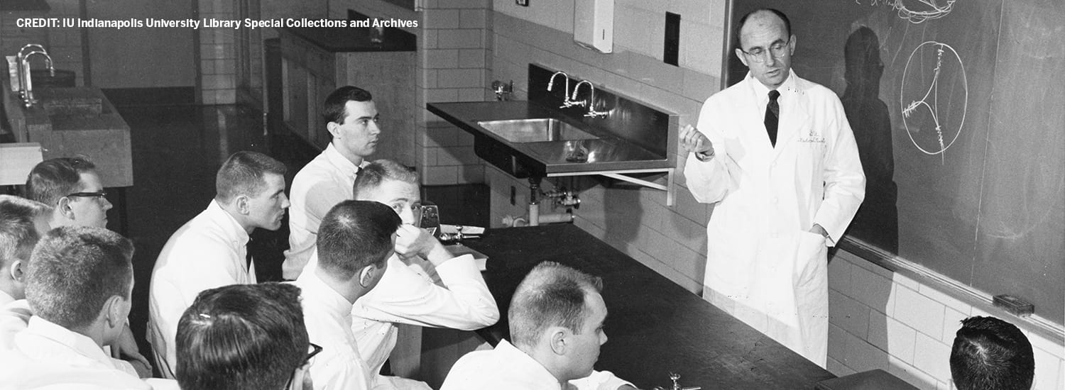 IU Indianapolis University Library Special Collections and Archives, black and white image of a professor teaching a pathology class