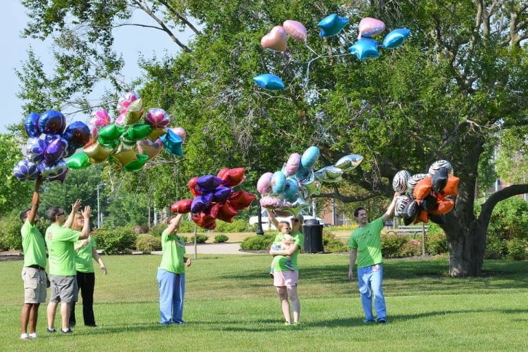 Members of the Riley pediatric critical care team participating in the memorial balloon release at the third annual Pediatric Critical Care Walk-a-Thon in 2018. Photo courtesy of Riley Children’s Health.
