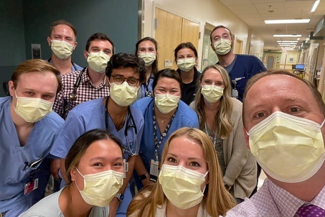 Brian McFerron, MD, on the unit teaching pediatric students