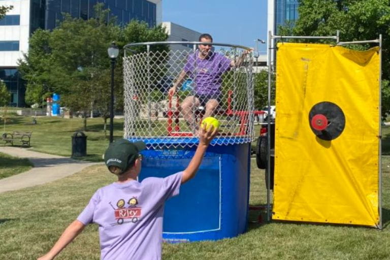 Riad Lutfi preparing to drop into the dunk tank at the ninth annual Pediatric Critical Care Walk-a-Thon in 2024. Photo courtesy of Riley Children’s Health. 